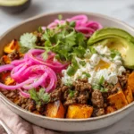 Hot honey ground beef bowl with sweet potatoes and avocado