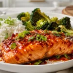 Sweet and spicy salmon recipe served with rice and roasted broccoli